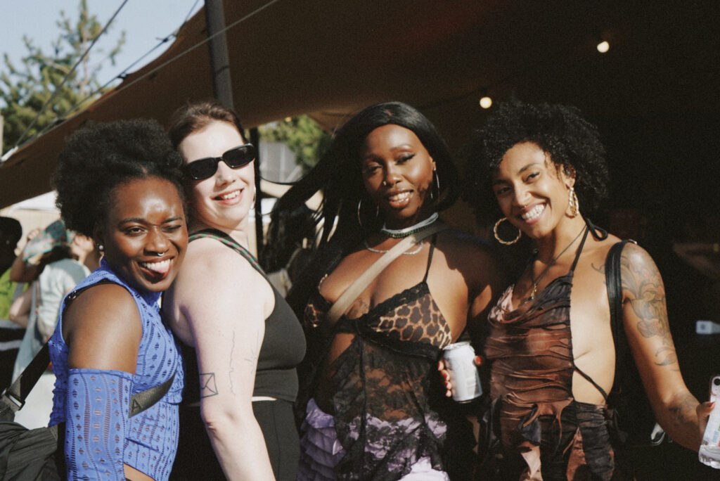 Four festivalgoers smile for the camera at Maiden Voyage Festival. This blog explores gender imbalance on festival line ups.